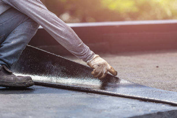 Professional Basement Waterproofing technician working in Columbus, GA
